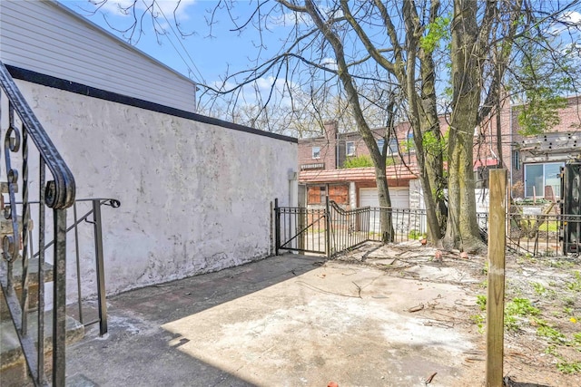179-55 Anderson Rd, Jamaica, NY 11434 - view of patio / terrace with fence and a gate