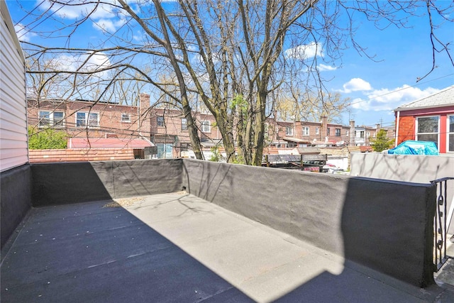 179-55 Anderson Rd, Jamaica, NY 11434 - view of patio / terrace featuring a balcony and a residential view