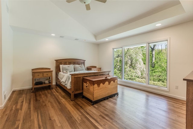 bedroom featuring ceiling fan, vaulted ceiling, recessed lighting, and hardwood / wood-style floors