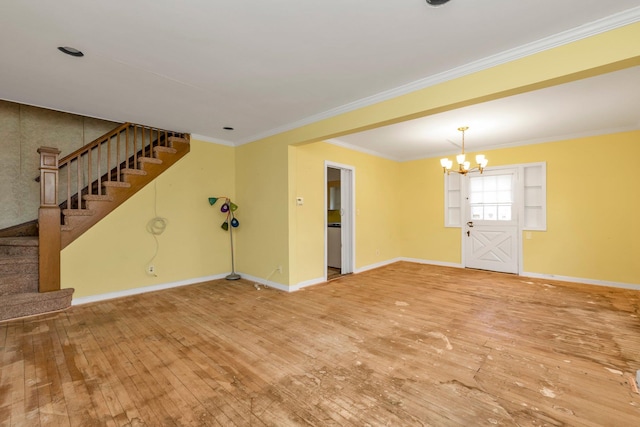 444 W Olive St, Long Beach, NY 11561 - interior space featuring crown molding, a notable chandelier, wood-type flooring, baseboards, and stairway