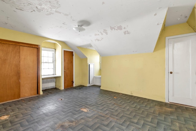 444 W Olive St, Long Beach, NY 11561 - additional living space with radiator and lofted ceiling