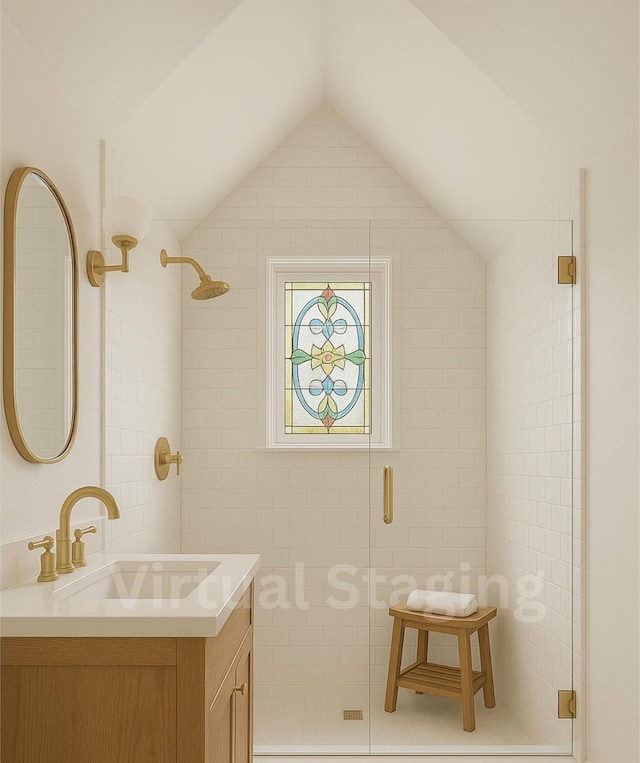444 W Olive St, Long Beach, NY 11561 - bathroom featuring vanity, lofted ceiling, and a stall shower