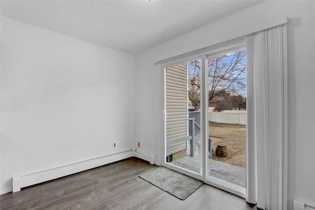176 Jackson Ave, Syosset, NY 11791 - doorway featuring a baseboard heating unit, wood finished floors, and baseboards