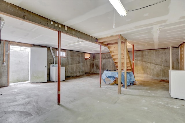 176 Jackson Ave, Syosset, NY 11791 - basement with washer / dryer and refrigerator