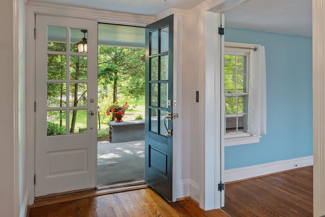 27 Bedford Rd, Pleasantville, NY 10570 - doorway to outside featuring wood finished floors and baseboards