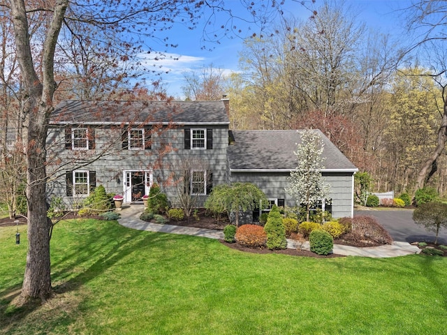 8 Richard Somers Rd, Granite Springs, NY 10527 - colonial inspired home with a chimney and a front yard