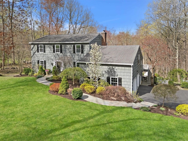 8 Richard Somers Rd, Granite Springs, NY 10527 - view of front of home with a chimney, driveway, a shingled roof, and a front yard