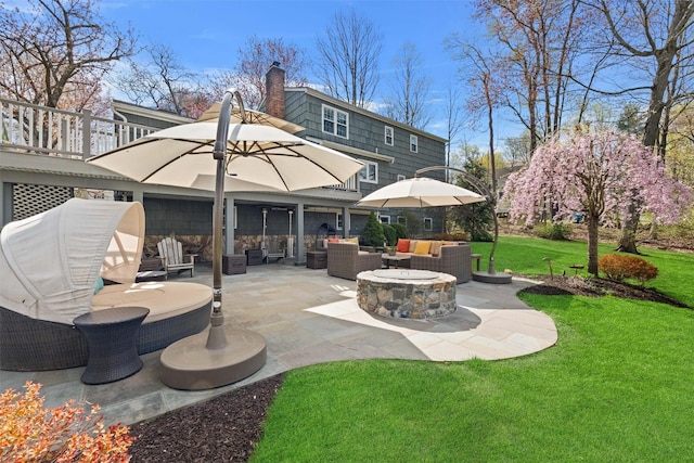 8 Richard Somers Rd, Granite Springs, NY 10527 - back of house with an outdoor living space with a fire pit, a yard, a chimney, and a patio