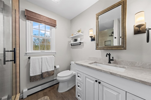 8 Richard Somers Rd, Granite Springs, NY 10527 - full bathroom with toilet, wood finished floors, a baseboard heating unit, and a shower with shower door