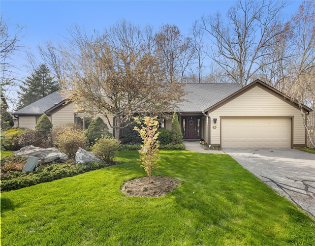 ranch-style home with an attached garage, driveway, a shingled roof, and a front yard