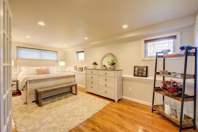 bedroom featuring recessed lighting, baseboards, and light wood finished floors