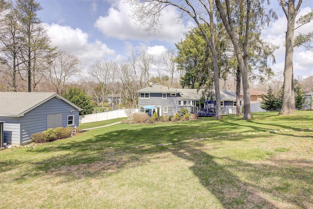 view of yard featuring fence