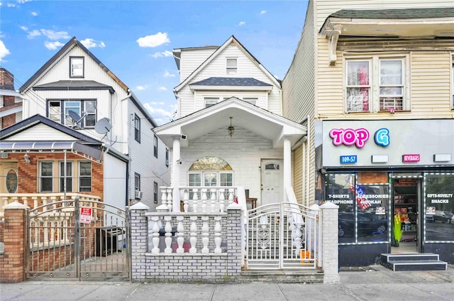 109-55 Lefferts Blvd, South Ozone Park, NY 11419 - view of front of home featuring fence and a gate