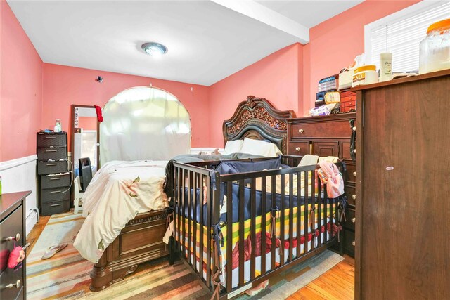 109-55 Lefferts Blvd, South Ozone Park, NY 11419 - bedroom with wainscoting and wood finished floors