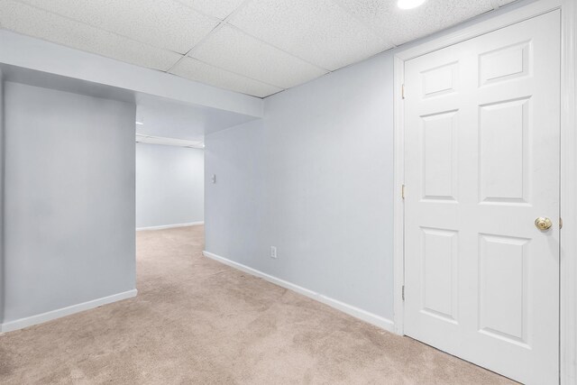 finished below grade area featuring carpet floors and baseboards