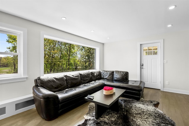 120 Loomis Ave, Yonkers, NY 10704 - living room with wood finished floors, recessed lighting, and baseboards