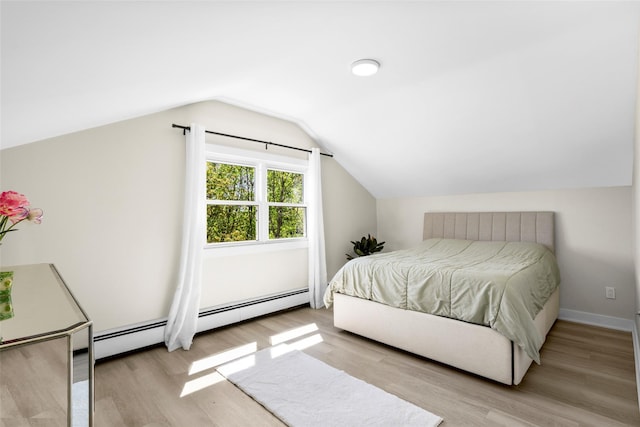 120 Loomis Ave, Yonkers, NY 10704 - bedroom with wood finished floors, lofted ceiling, and baseboards