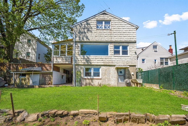 120 Loomis Ave, Yonkers, NY 10704 - rear view of house with a sunroom