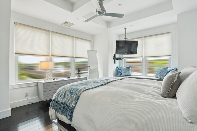 bedroom featuring baseboards, visible vents, a ceiling fan, and dark wood-type flooring