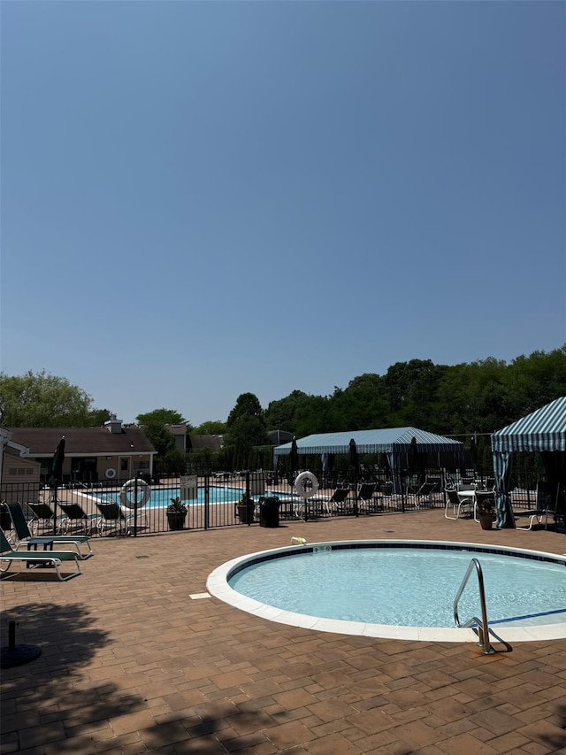 108 Hidden Ponds Cir, Smithtown, NY 11787 - community pool with a patio area