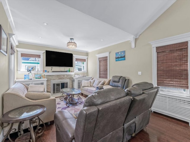 565 Baldwin Ave, North Baldwin, NY 11510 - living area with a glass covered fireplace, ornamental molding, and wood finished floors