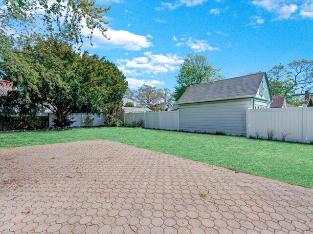 565 Baldwin Ave, North Baldwin, NY 11510 - view of yard with a patio and a fenced backyard