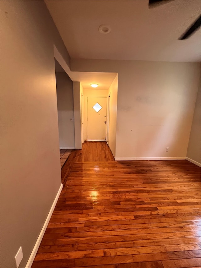 57 Prince St, Middletown, NY 10940 - hallway with baseboards and hardwood / wood-style flooring