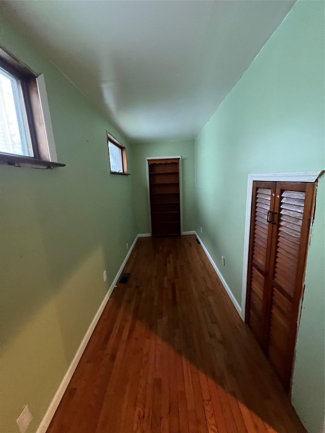 57 Prince St, Middletown, NY 10940 - hall with baseboards, wood finished floors, and visible vents