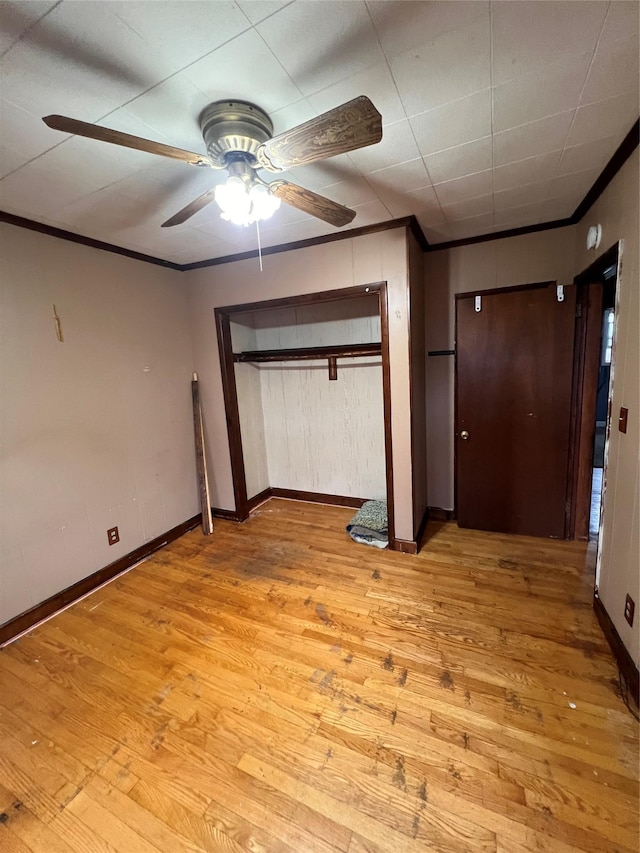 57 Prince St, Middletown, NY 10940 - unfurnished bedroom with crown molding, baseboards, and light wood-style flooring