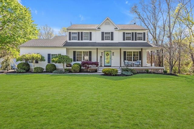 7 Karen Ct, Wading River, NY 11792 - view of front of house featuring a porch and a front lawn