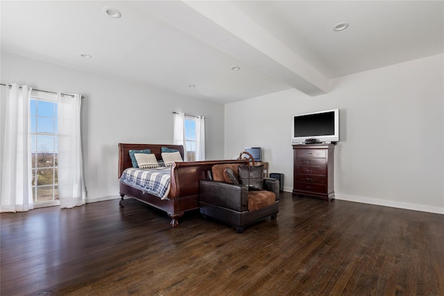 bedroom with beamed ceiling, dark wood-style floors, recessed lighting, and baseboards