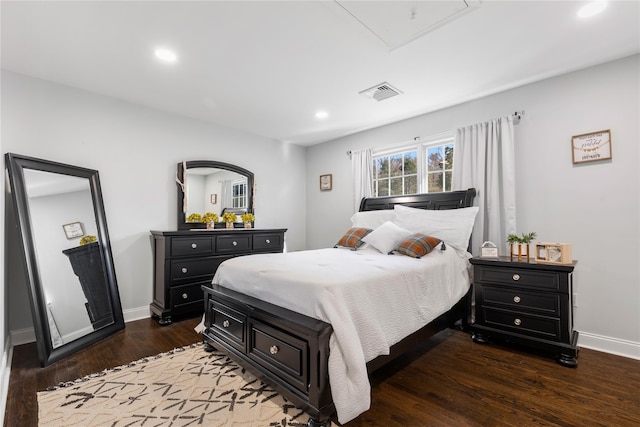 bedroom featuring recessed lighting, visible vents, baseboards, and dark wood finished floors