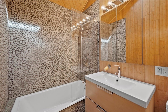 full bath with toilet,  shower combination, and vanity