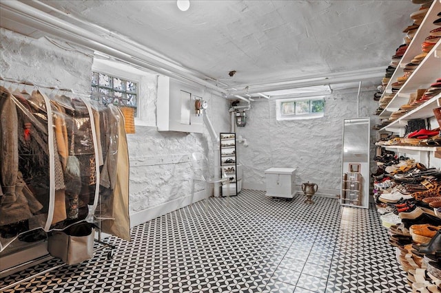 below grade area featuring tile patterned floors