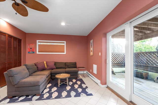 living area featuring light tile patterned flooring, ceiling fan, recessed lighting, baseboards, and a baseboard radiator