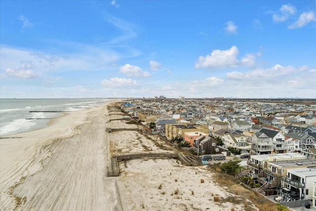 aerial view with a view of the beach and a water view