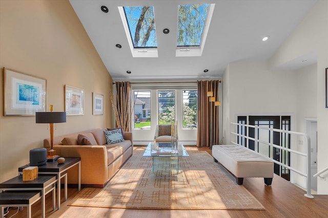 living room featuring high vaulted ceiling, recessed lighting, wood finished floors, a baseboard radiator, and a baseboard heating unit