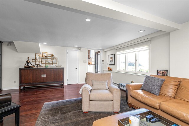 living room featuring recessed lighting, baseboards, and wood finished floors