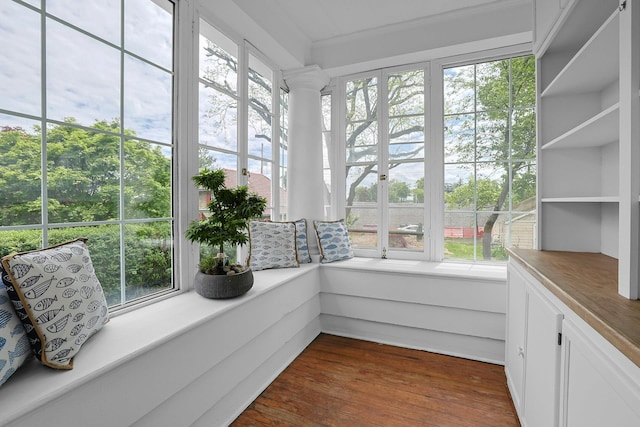 sunroom / solarium with wood finished floors and french doors