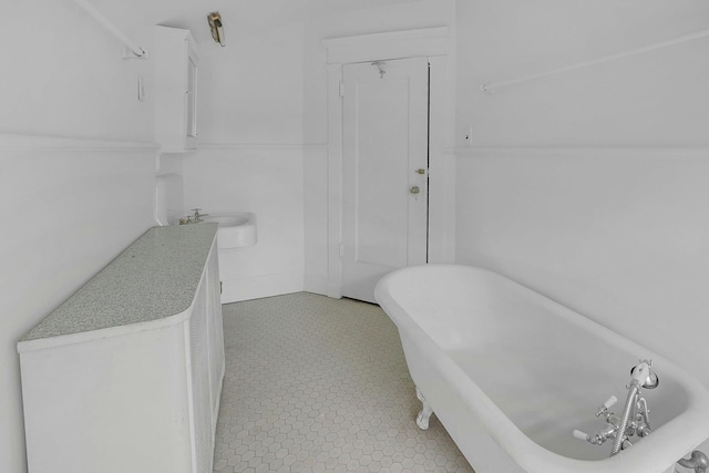 full bathroom featuring a freestanding bath