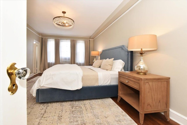 8 Barstow Rd Unit 6-D, Great Neck, NY 11021 - bedroom featuring dark wood-style flooring and baseboards