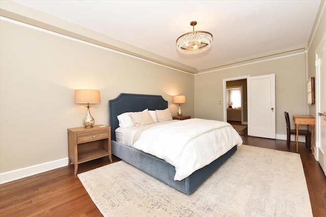8 Barstow Rd Unit 6-D, Great Neck, NY 11021 - bedroom featuring baseboards and wood finished floors