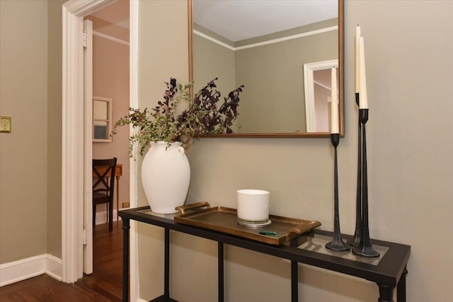 8 Barstow Rd Unit 6-D, Great Neck, NY 11021 - hallway featuring crown molding, baseboards, and dark wood finished floors