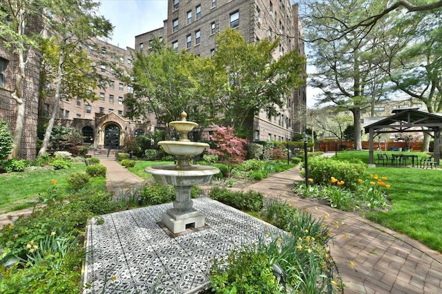 8 Barstow Rd Unit 6-D, Great Neck, NY 11021 - surrounding community featuring a gazebo and a lawn