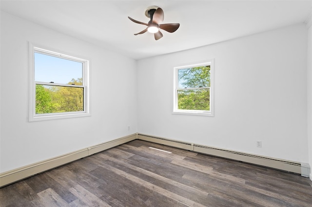 empty room featuring ceiling fan and wood finished floors