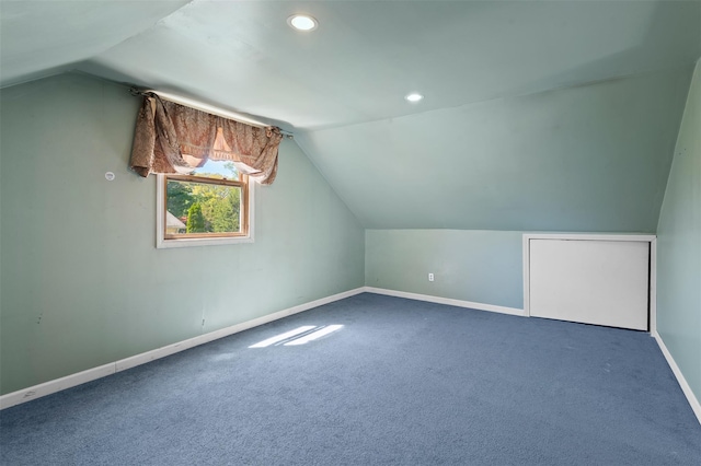 bonus room featuring baseboards, vaulted ceiling, recessed lighting, and carpet flooring