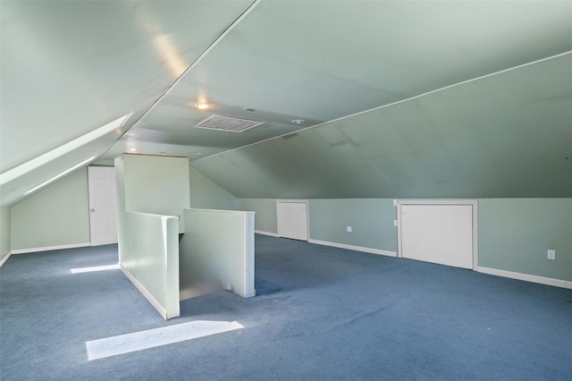bonus room featuring carpet flooring, baseboards, and lofted ceiling