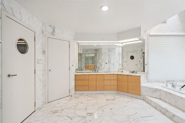 80 Valentines Ln, Old Brookville, NY 11545 - full bathroom featuring marble finish flooring, a garden tub, double vanity, and a marble finish shower