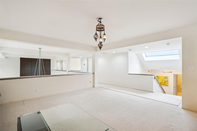 80 Valentines Ln, Old Brookville, NY 11545 - spare room featuring carpet flooring, a skylight, and beamed ceiling