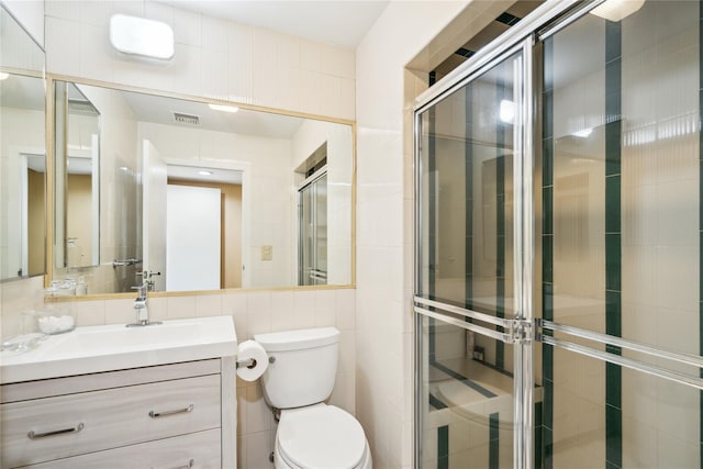 80 Valentines Ln, Old Brookville, NY 11545 - bathroom with tile walls, a stall shower, toilet, and vanity